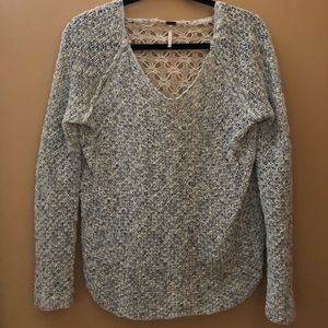 Blue and white blue over sweater with lace back